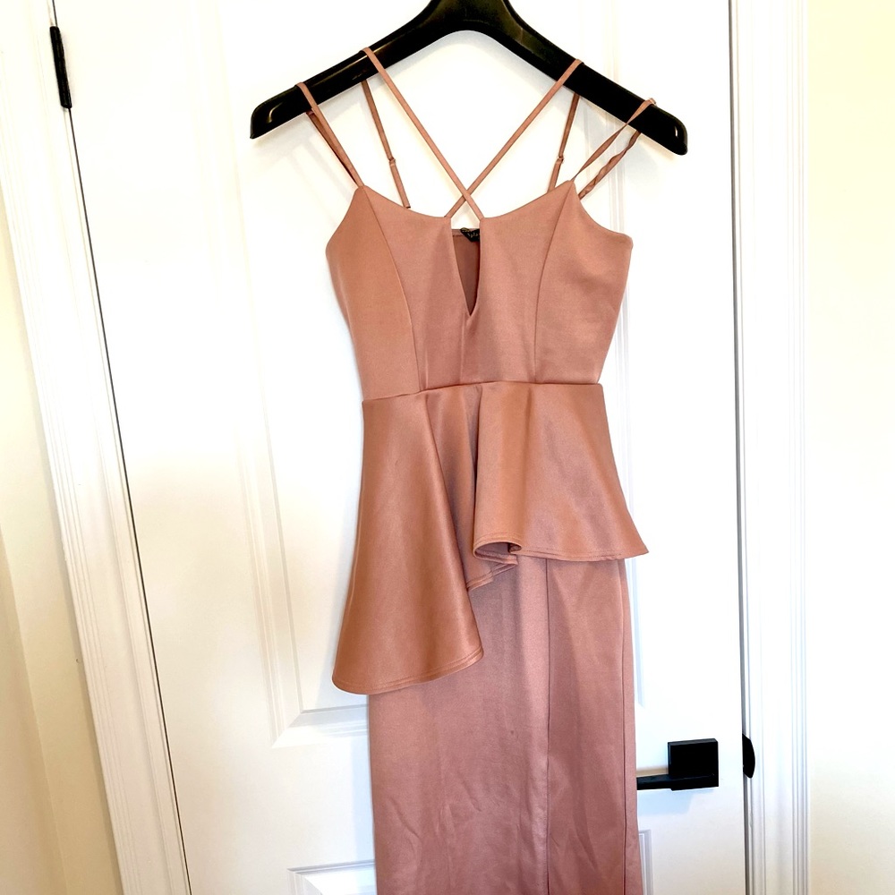 Cocktail peplum dress with knee high slit